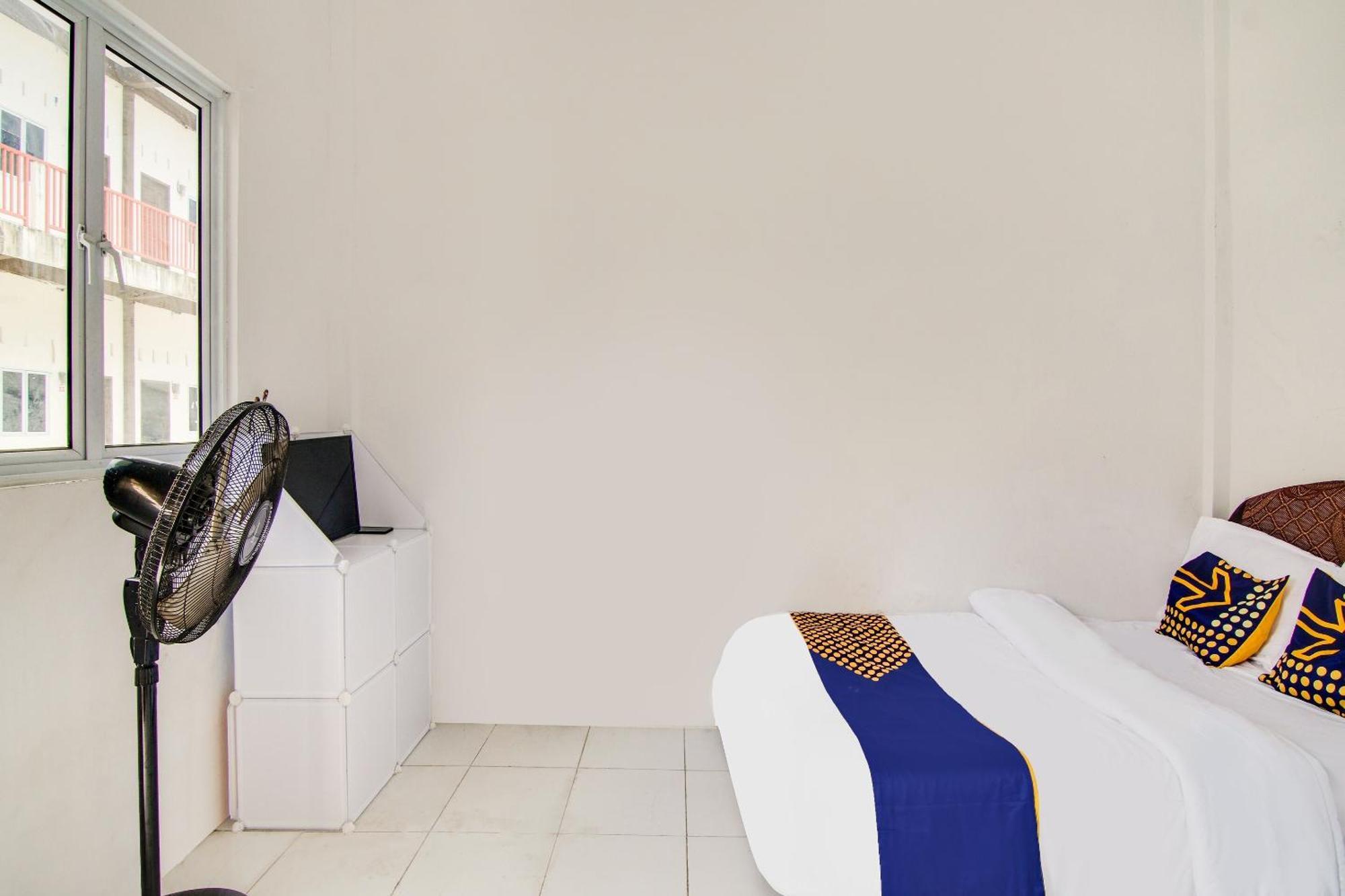 Spot On 91858 Raja Homestay Syariah Pekanbaru Buitenkant foto