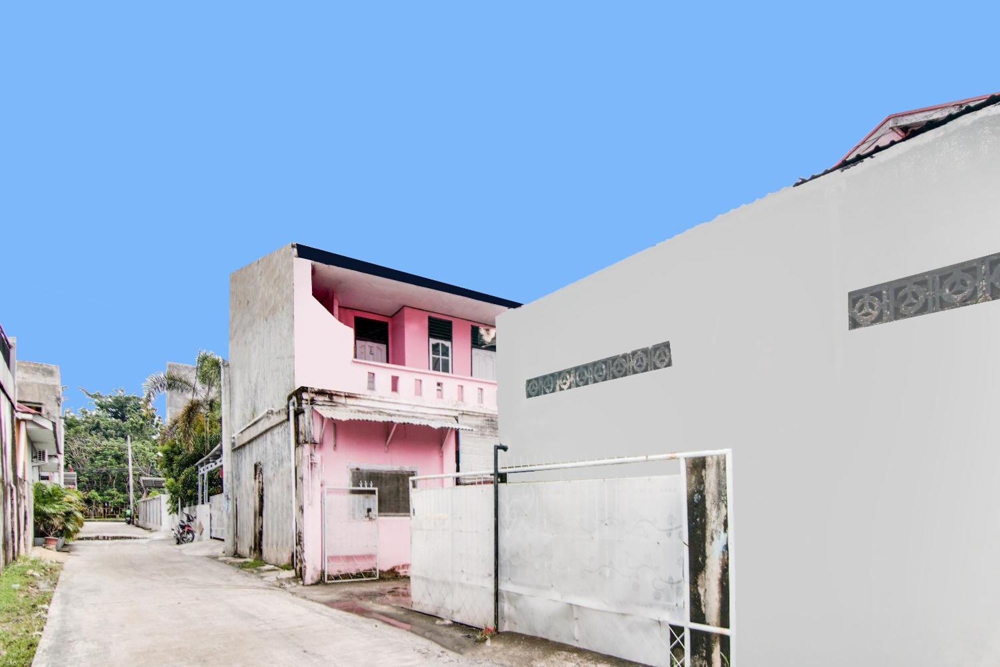 Spot On 91858 Raja Homestay Syariah Pekanbaru Buitenkant foto