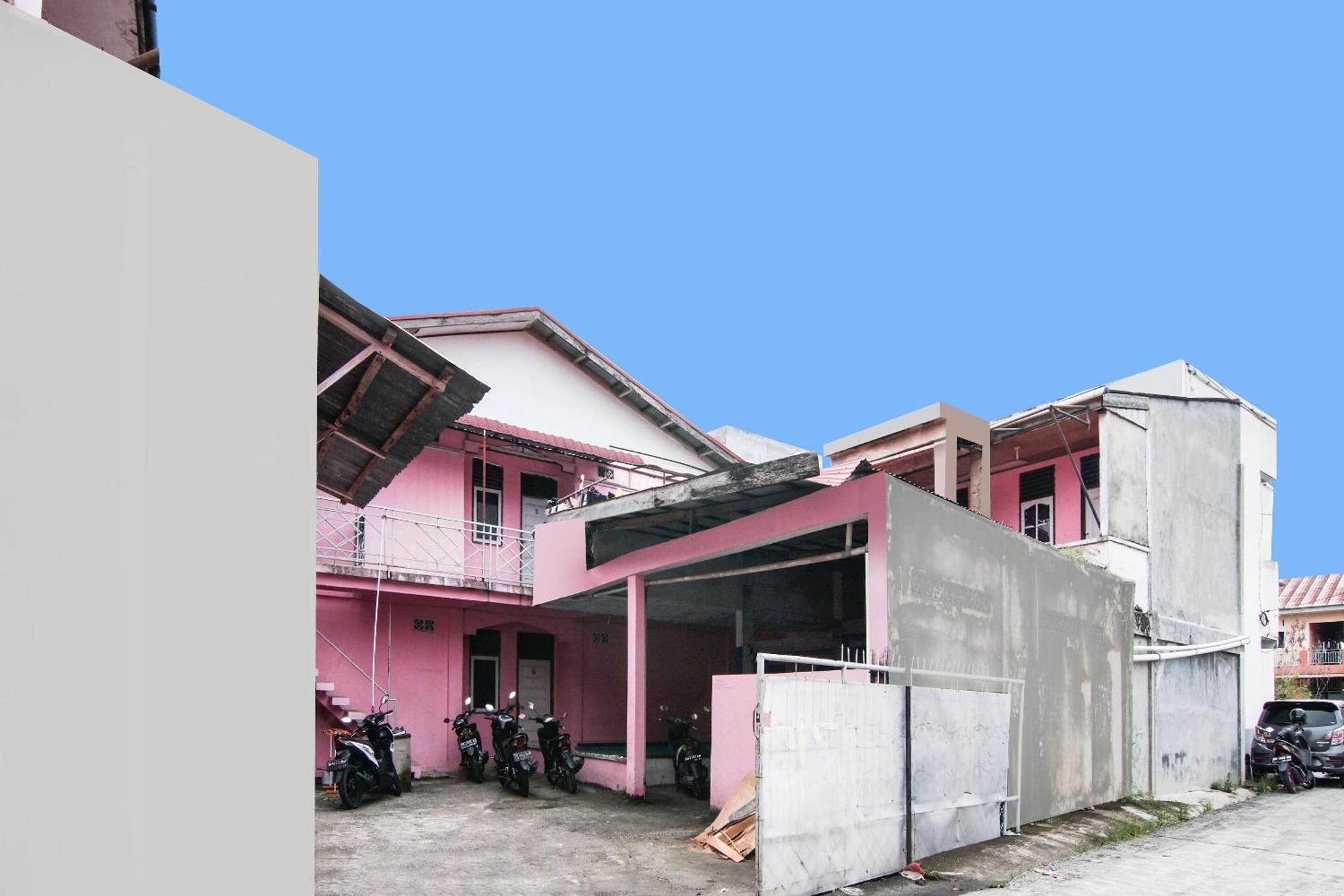 Spot On 91858 Raja Homestay Syariah Pekanbaru Buitenkant foto